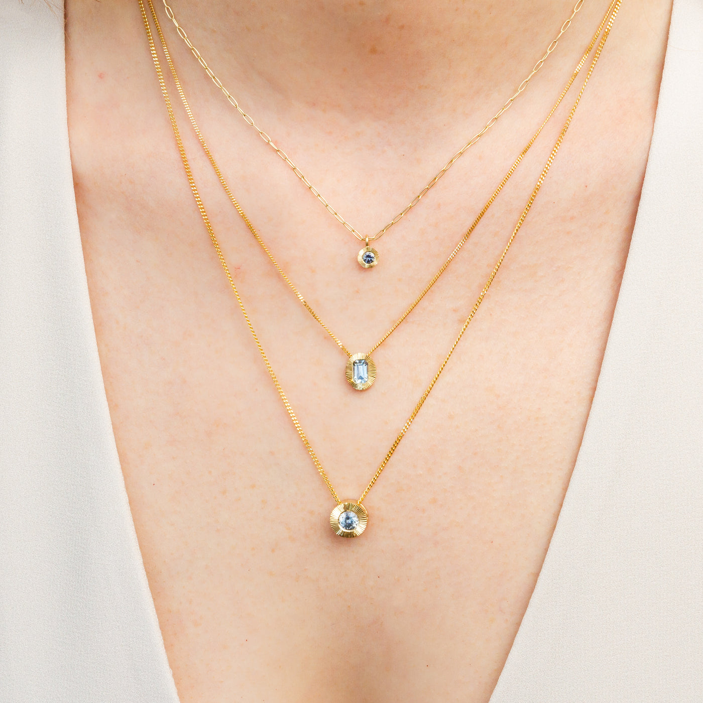 North/South Oval Aurora Necklace with Light Blue Emerald Cut Montana Sapphire