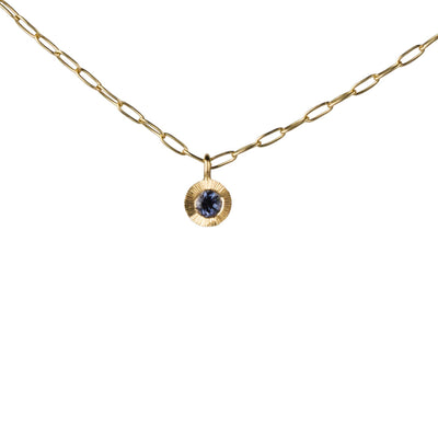 Aurora Drop Pendant with Purplish Blue Montana Sapphire on Paperclip Chain in Yellow Gold on a white background