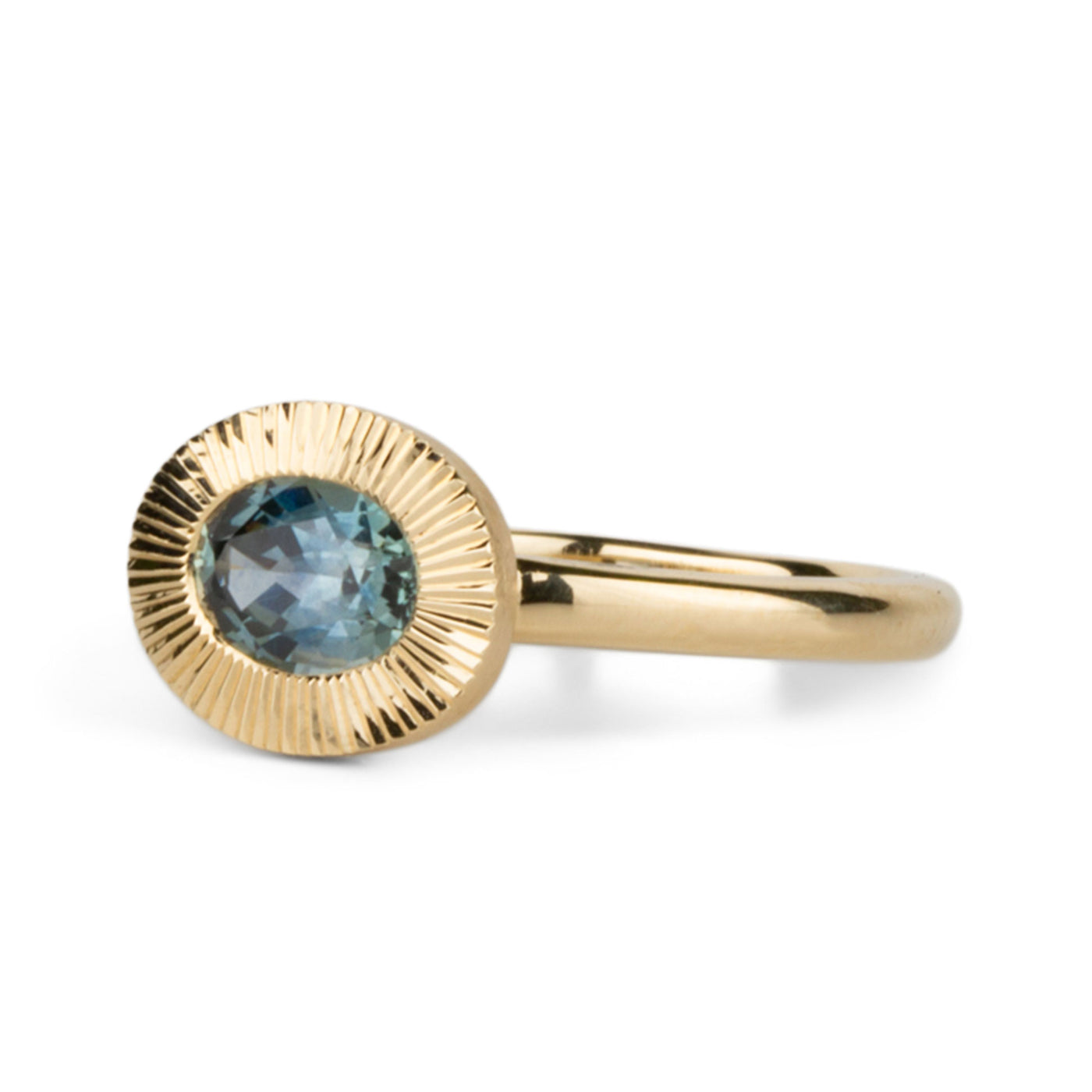 East-West Aurora Solitaire with Blue-Green Montana Sapphire on a white background, side angle