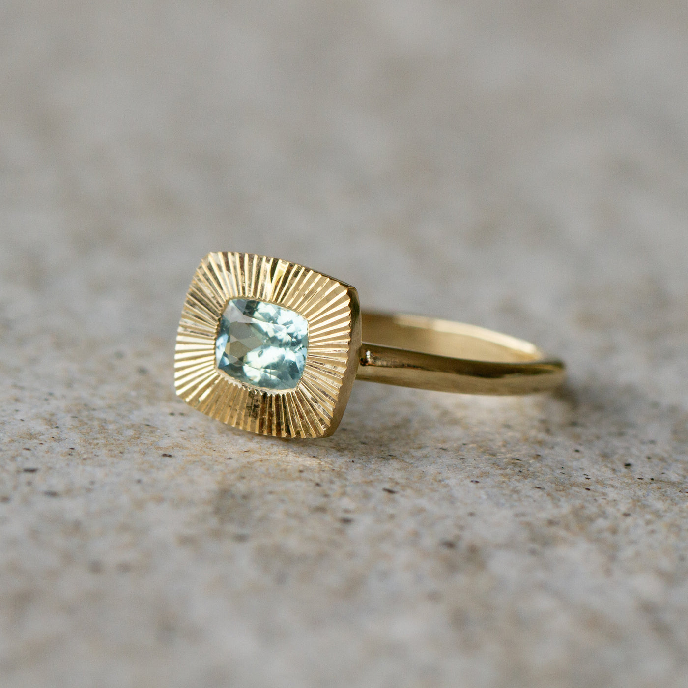East-West Cushion Aurora Ring 14KY with Light Teal Montana Sapphire