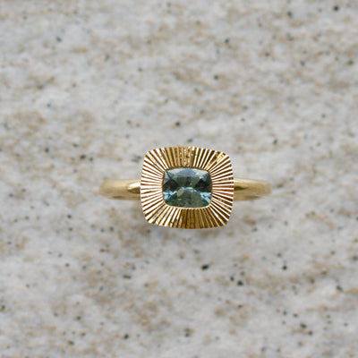 East-West Cushion Aurora Ring 14KY with Light Teal Montana Sapphire