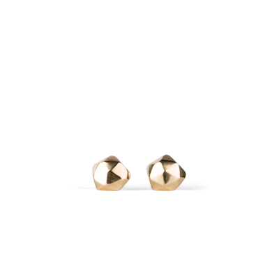 14k yellow gold geometric faceted stud earrings in the micro size on a white background by Corey Egan