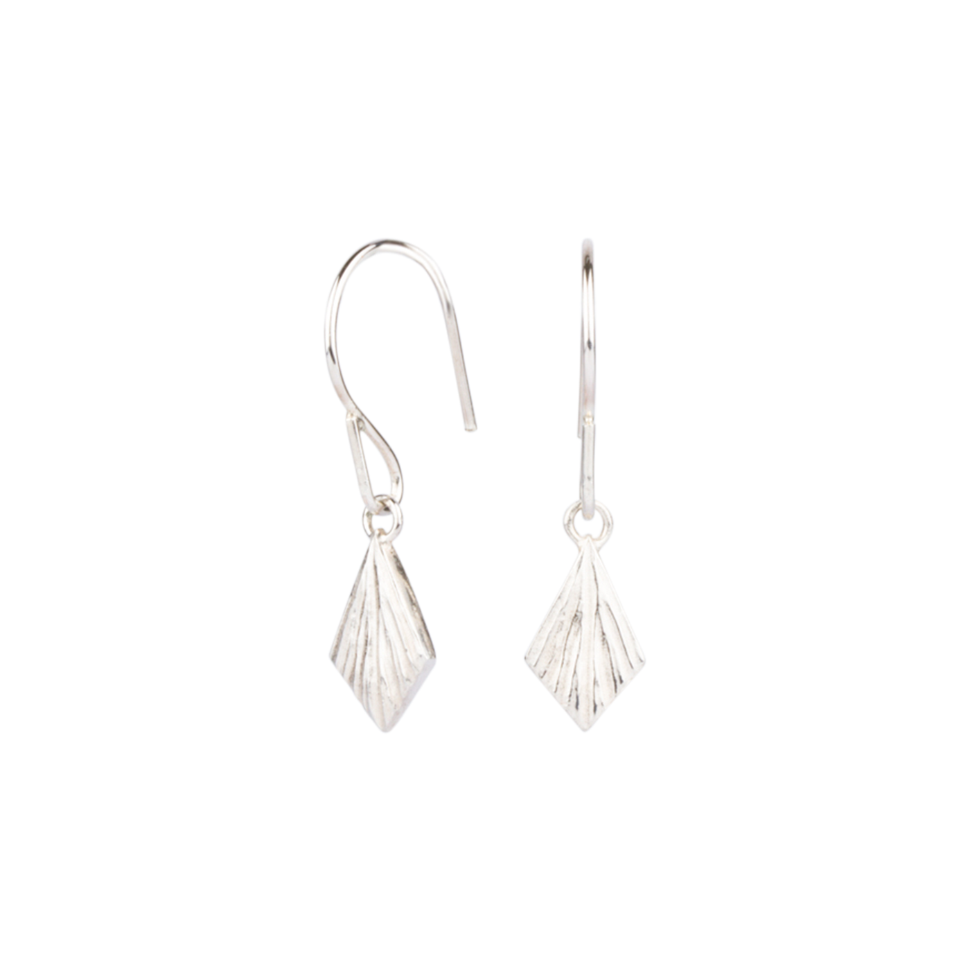 Silver Flame Dangle Earrings by Corey Egan side view on a white background