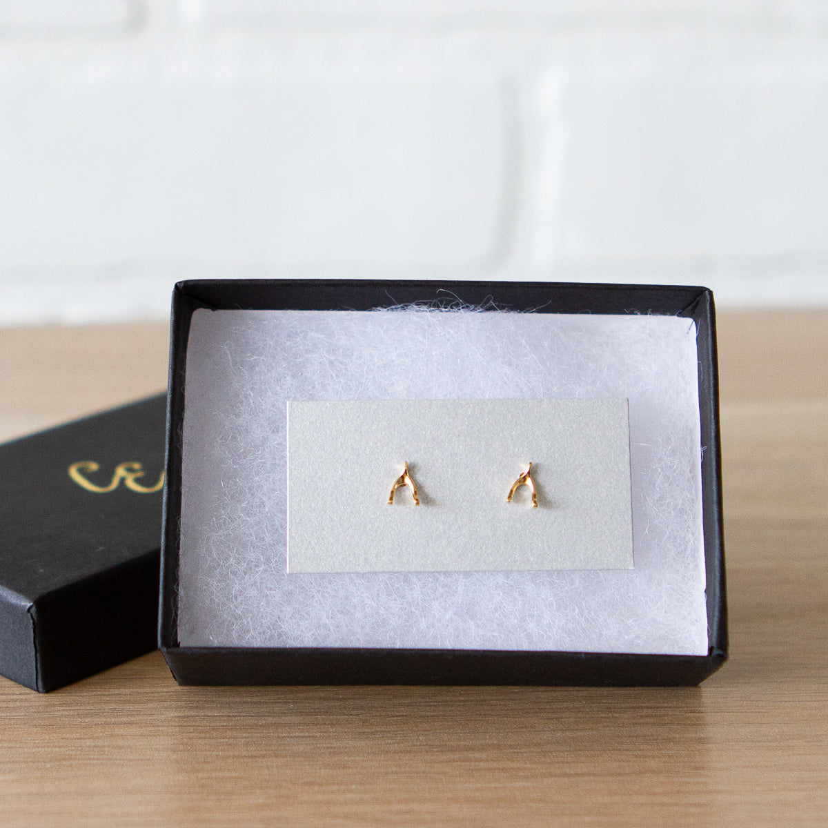 Vermeil Wishbone Stud Earrings by Corey Egan in a gift box
