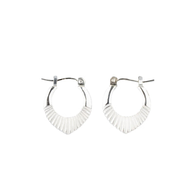 Silver Small Oblong hoops with hinge closure and sunburst bottom by Corey Egan on a white background
