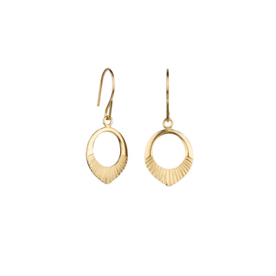 Side view gold vermeil small open petal shape earrings with sunburst bottoms on a white background