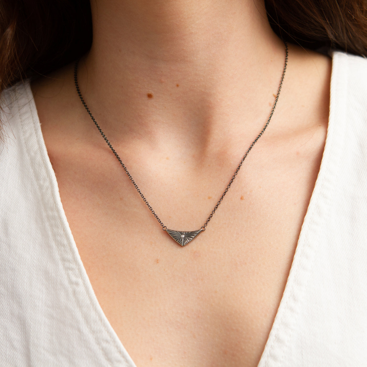 Oxidized Silver Flash Necklace modeled on a neck