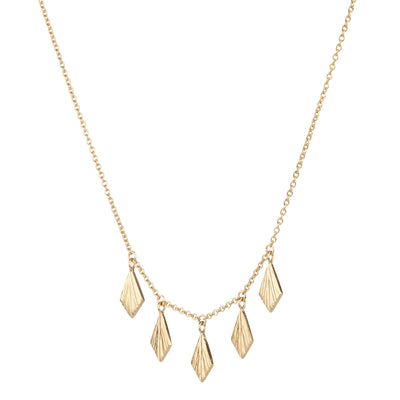 layering bib necklace with five flame fan dangles in gold vermeil side view on a white background