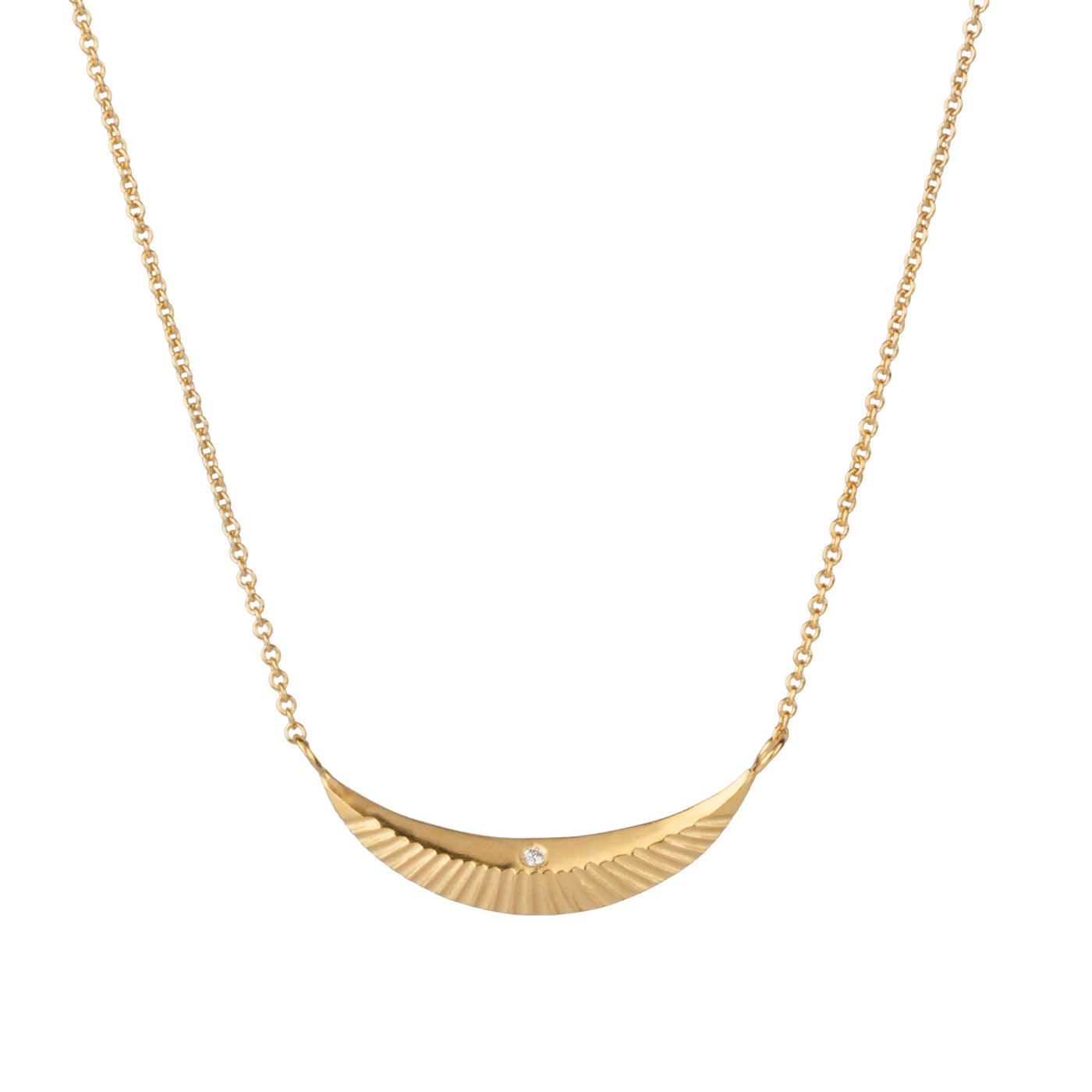 Crescent necklace with carved rays and a single diamond in vermeil  on a white background