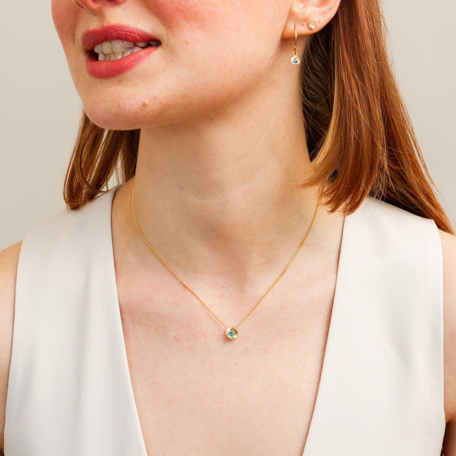 Light Green Montana Sapphire Medium Aurora Necklace in Yellow Gold on a model