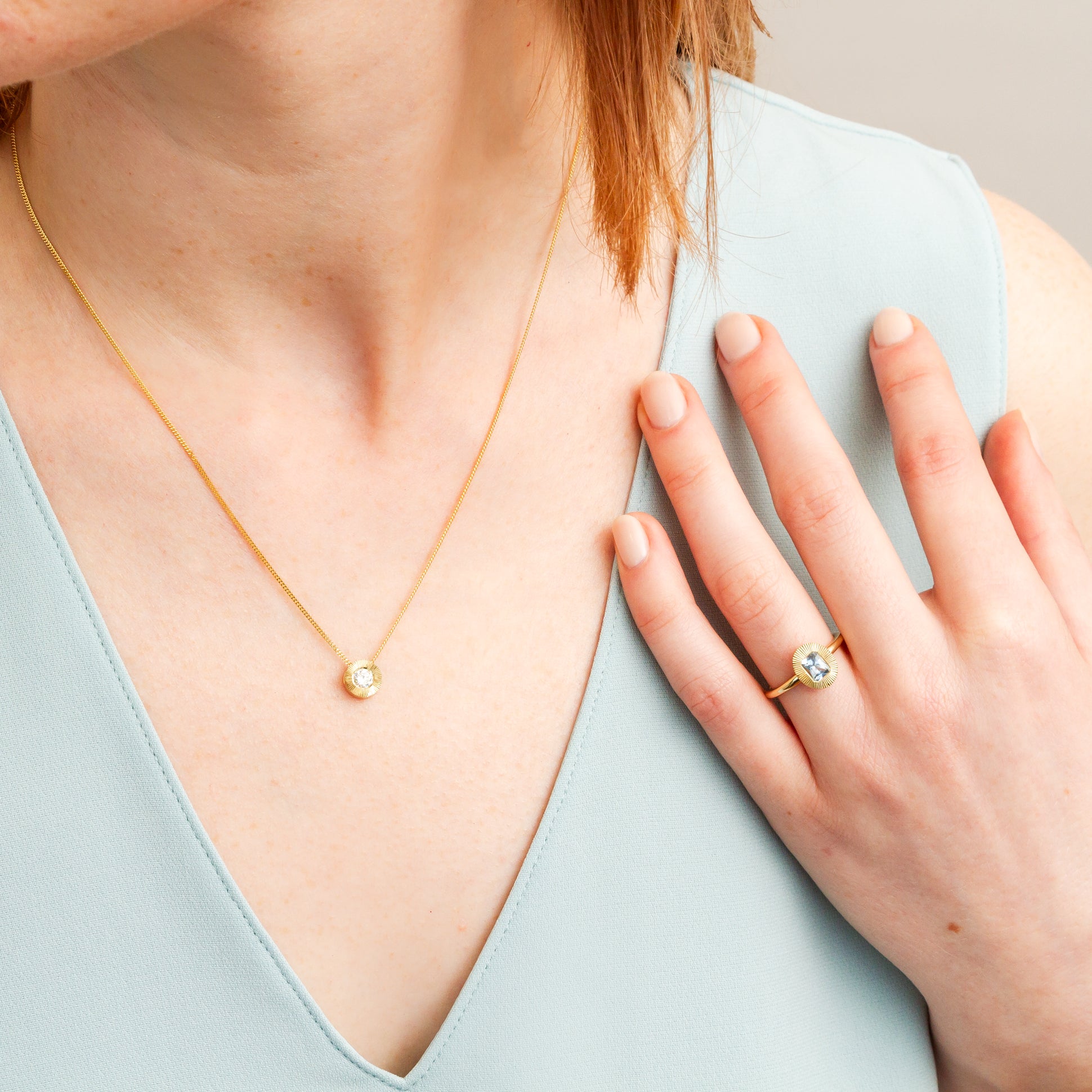 Old European Cut Diamond Medium Aurora Necklace In Yellow Gold on a model, close up