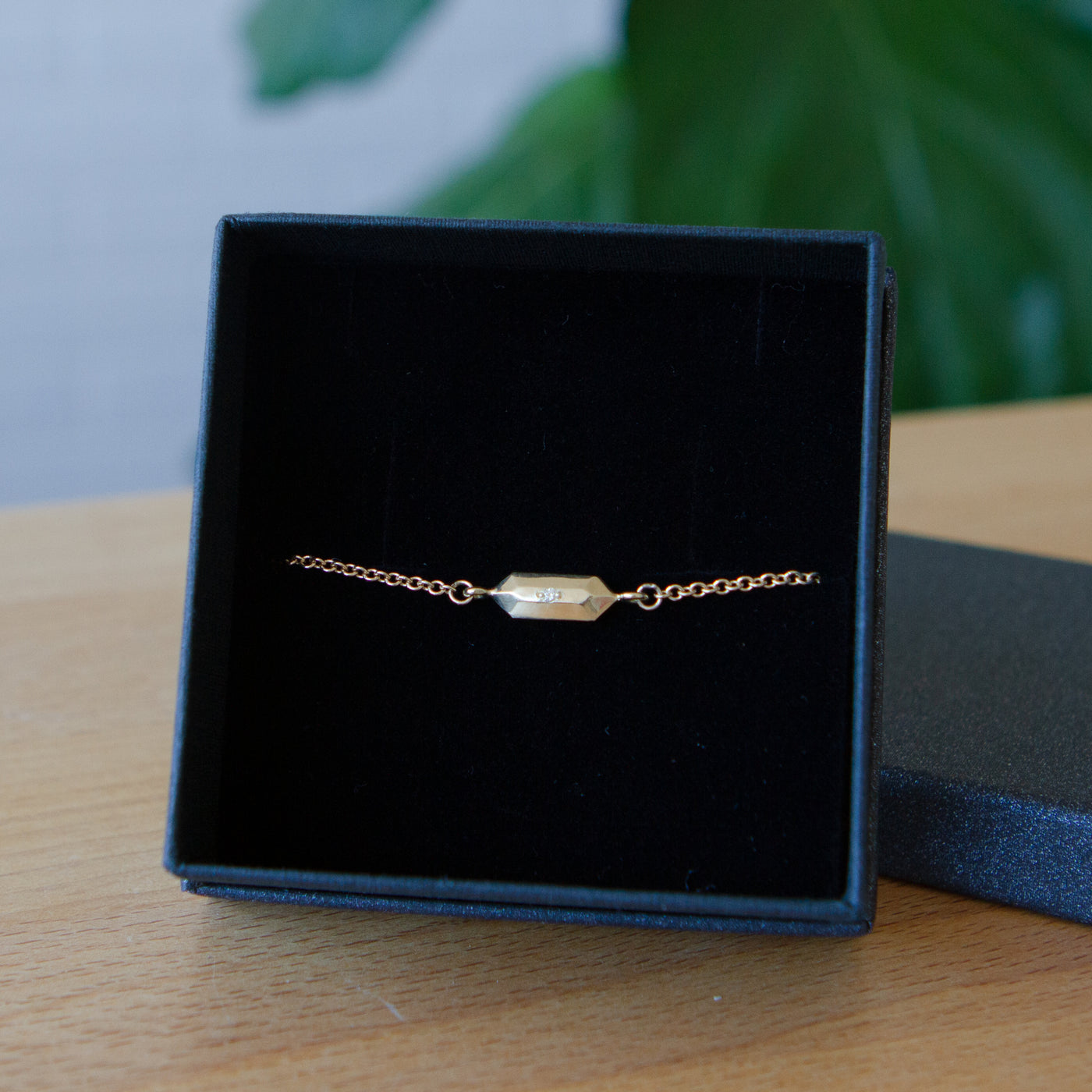 Fragment Chain Bracelet with Diamond in Gold packaged in a jewelry box