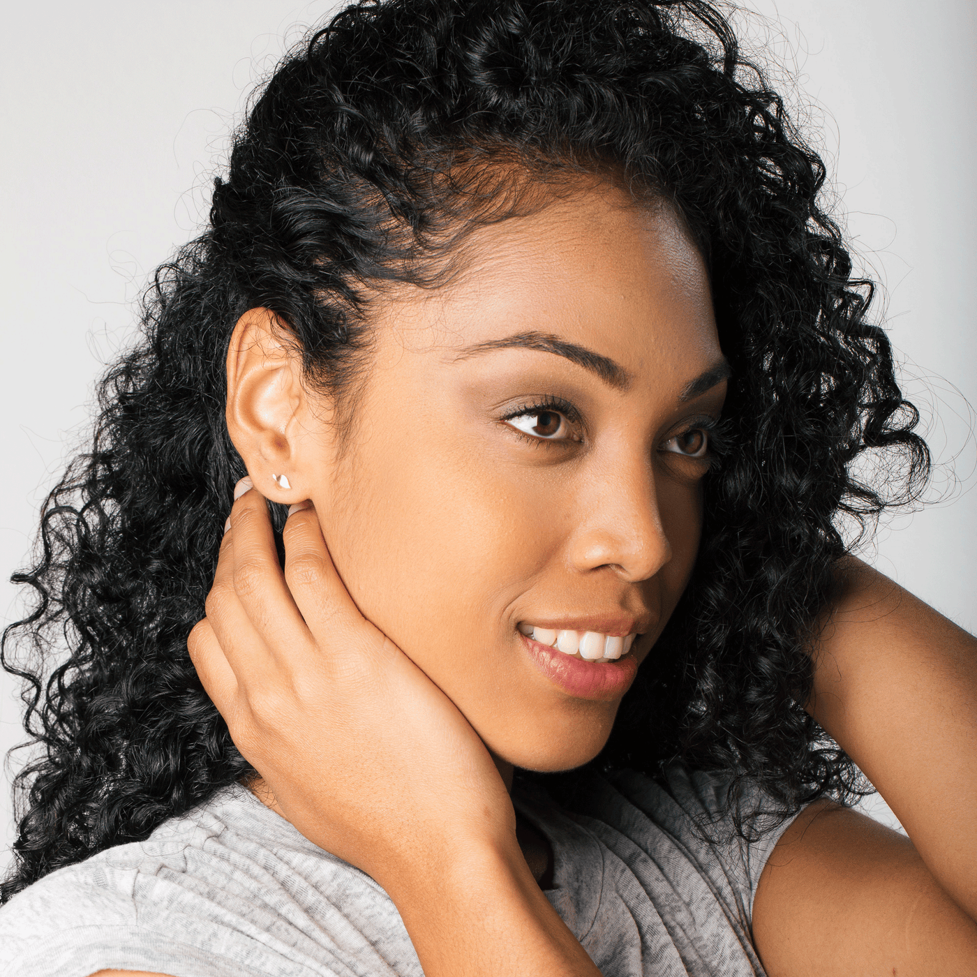 Yellow Gold Aspen Stud Earrings on a model by Corey Egan