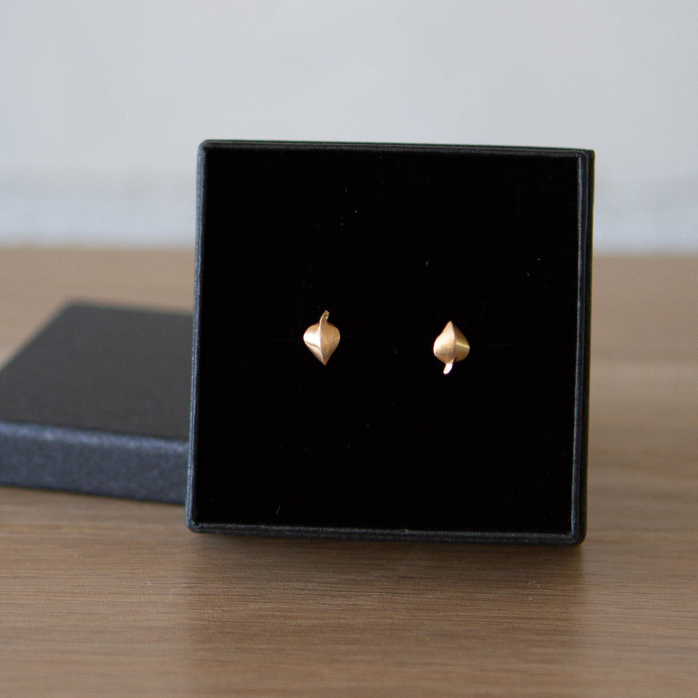 Yellow Gold Aspen Stud Earrings in a gift boxby Corey Egan