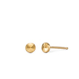 Tiny engraved gold stud earring by Corey Egan on a white background