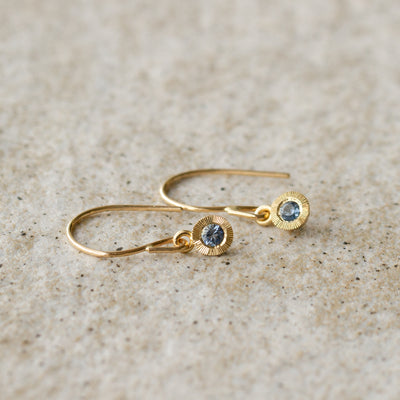 Blue Montana Sapphire Aurora Dangle Earrings in Yellow Gold on a neutral background 2