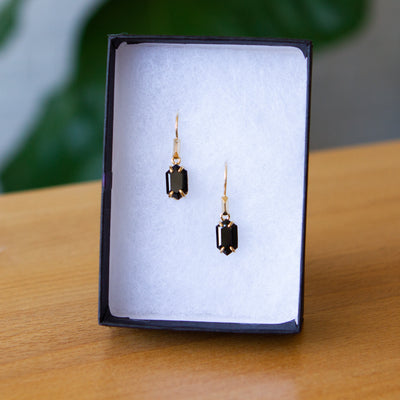 Eloise Black Garnet Earrings in Vermeil packaged in a jewelry box