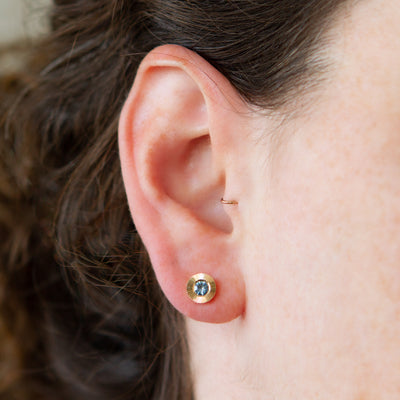 Blue Montana Sapphire Extra Large Aurora Stud Earrings in Yellow Gold modeled on an ear