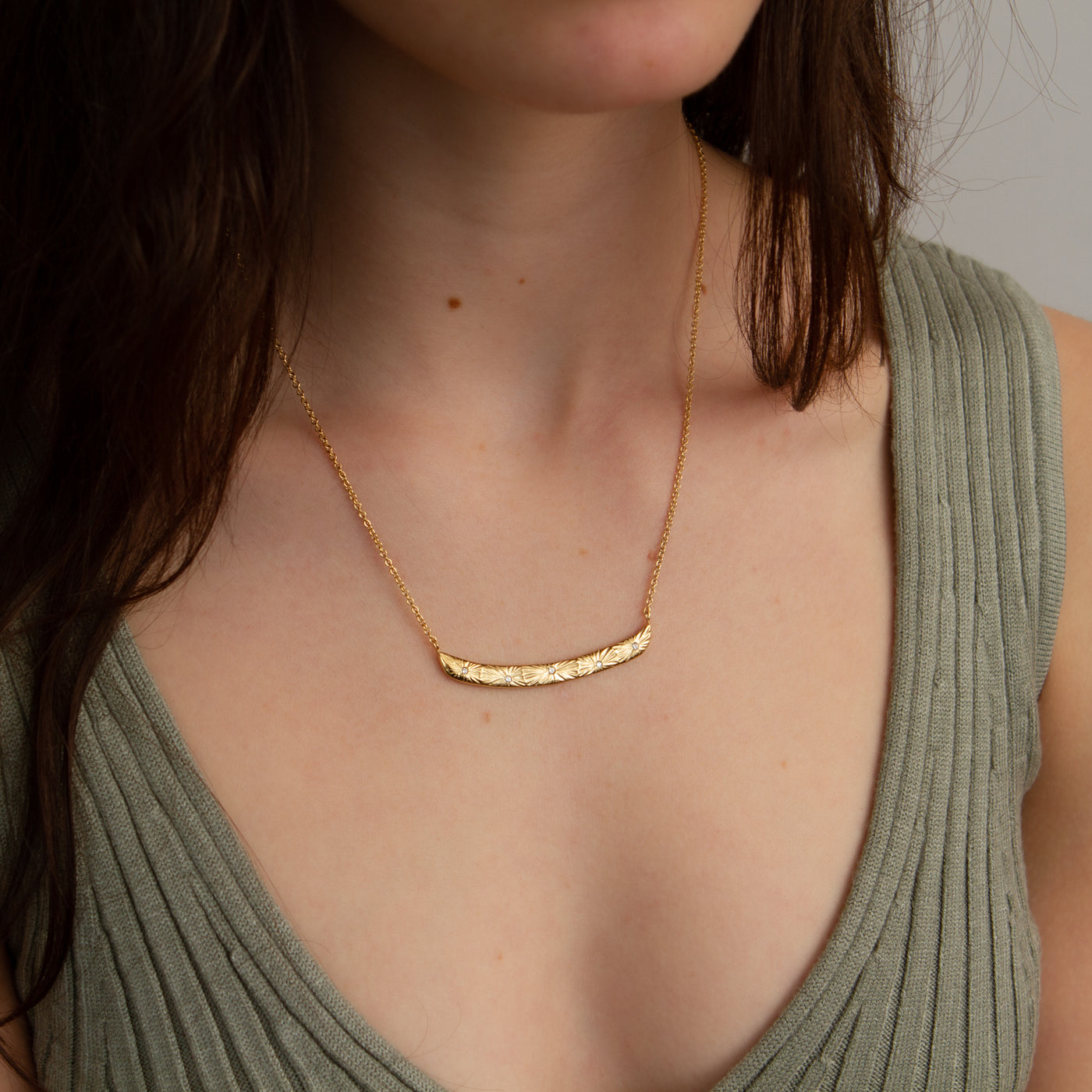 Luminous Bar Vermeil Necklace modeled on a neck, side angle