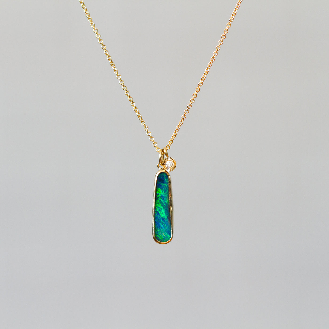 Australian Opal Gold Theia Necklace on a plain background, front angle