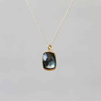 London Blue Topaz Silver and Gold Theia Necklace #8 on a plain background, front angle