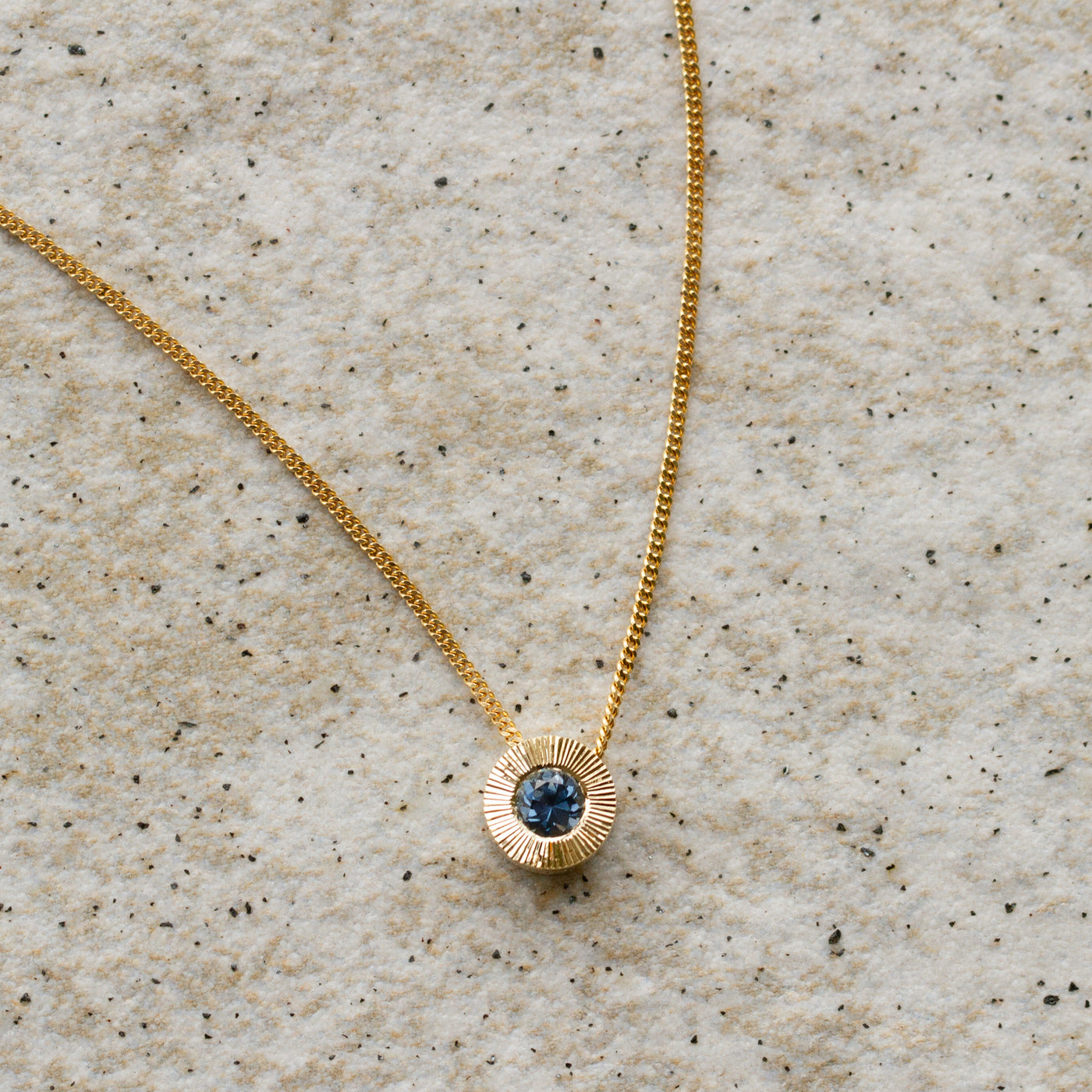 Medium Blue Montana Sapphire Medium Aurora Necklace on a neutral background