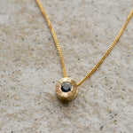 Medium Blue Montana Sapphire Medium Aurora Necklace on a neutral background, close up