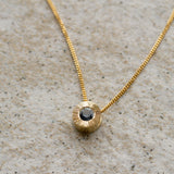 Medium Blue Montana Sapphire Medium Aurora Necklace on a neutral background, close up