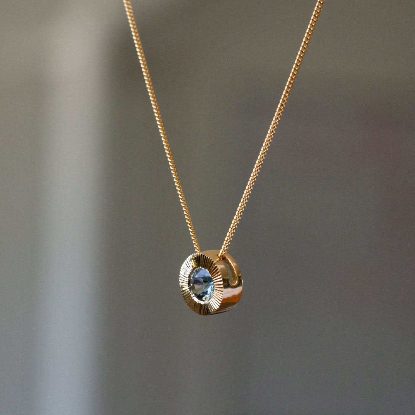 14ky Aurora Slide Pendant necklace with .68ct Light Blue Montana Sapphire