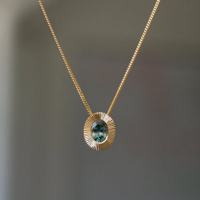 North/South Oval Aurora Pendant Necklace with .65ct light teal Oval Montana Sapphire