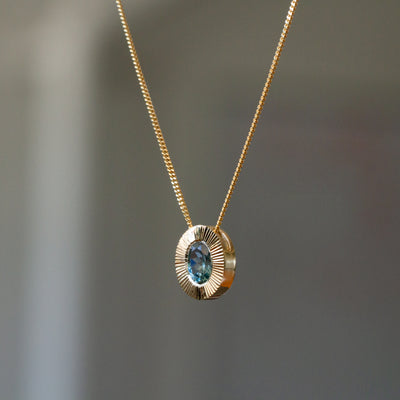 North/South Oval Aurora Pendant Necklace with .65ct light teal Oval Montana Sapphire