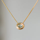 Sideways Oval Aurora Pendant Necklace with .78ct Light Green Sapphire