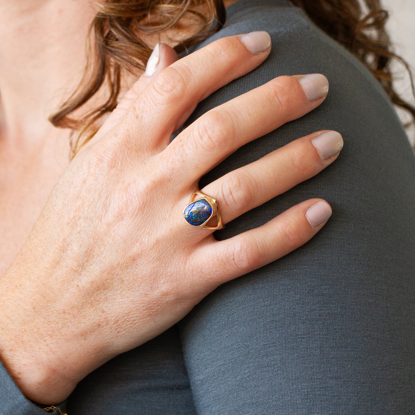 Australian Boulder Opal Gold Cleo Ring #2 modeled on a hand