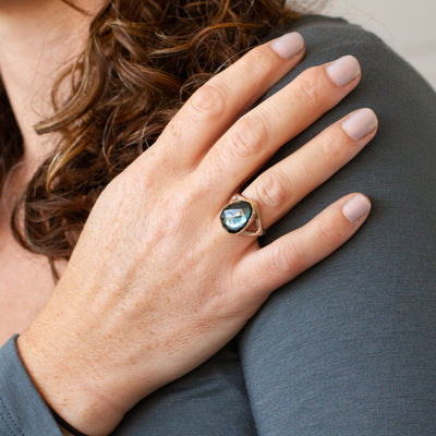 London Blue Topaz Silver and Gold Cleo Ring #7 modeled on a hand