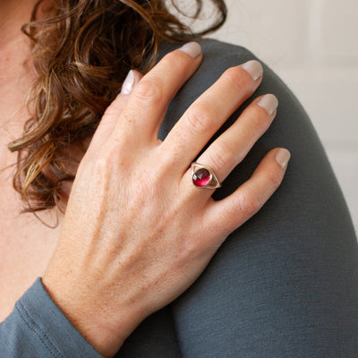 Pink Tourmaline Silver and Gold Cleo Ring modeled on a hand