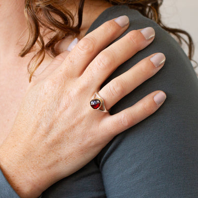 Red Tourmaline Silver and Gold Cleo Ring modeled on a hand