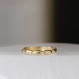 Gold Pebble Eternity Band