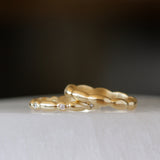 Gold Pebble Droplet Eternity Band