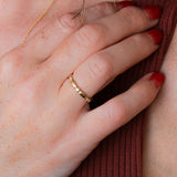 Gold Pebble Droplet Eternity Band