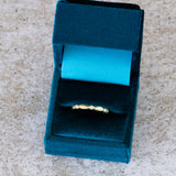 Gold Pebble Droplet Eternity Band