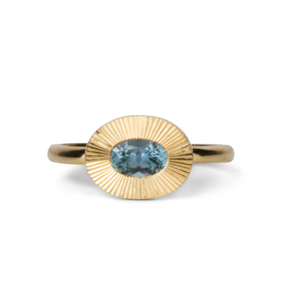 East-West Aurora Solitaire with Teal Oval Montana Sapphire on a white background, front angle