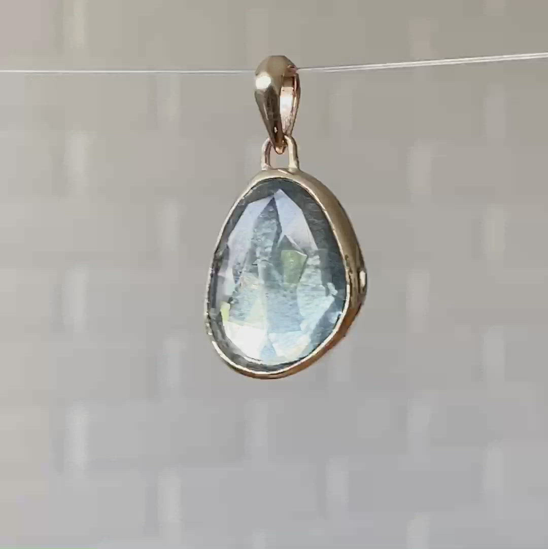 Rose cut moss aquamarine bijou pendant with a gold bezel and faceted gold bail