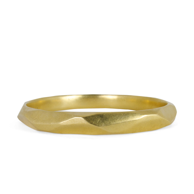 Yellow Bronze Faceted Denali Bangle by Corey Egan on a white background