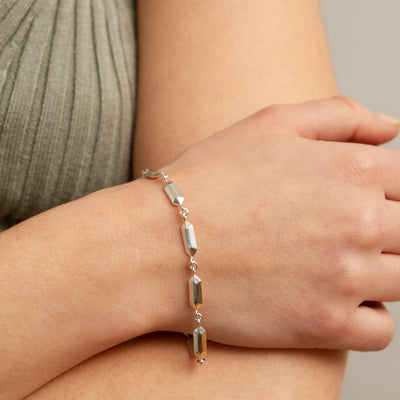 Fragment Link Bracelet in Silver modeled on a wrist