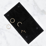 Corey Egan Logo Jewelry Pouch with rings peeking out