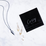 Corey Egan Logo Jewelry Pouch closed