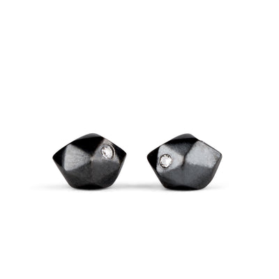 Oxidized Silver Faceted Stud earrings with Diamonds on a white backgound