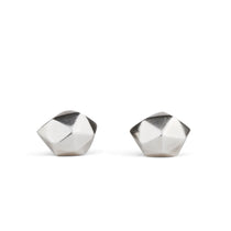Sterling silver wabi-sabi faceted geometric stud earrings by Corey Egan on a white background