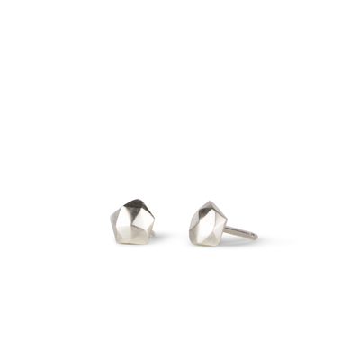 sterling silver micro size geometric faceted stud earrings by Corey Egan on a white background