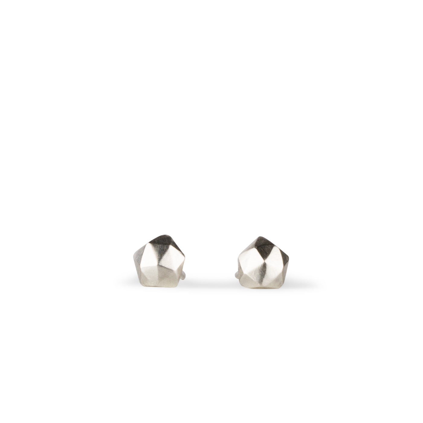  sterling silver micro size geometric faceted stud earrings by Corey Egan on a white background